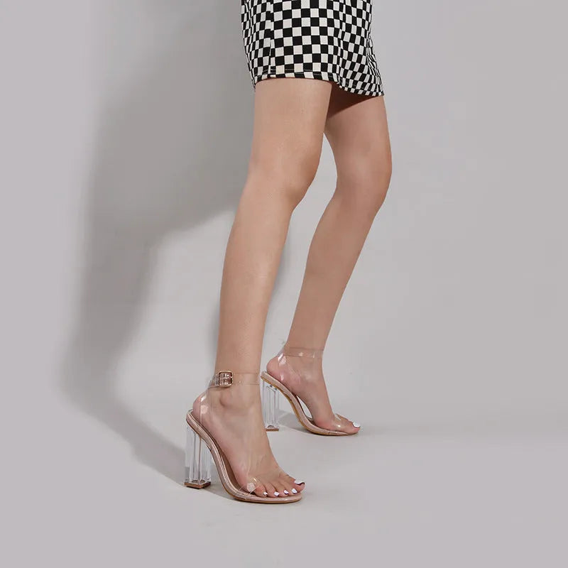 Apricot women's high heel sandals with a transparent glass heel and buckle fastening