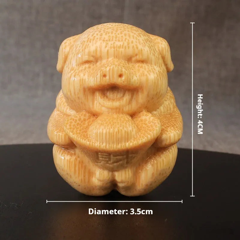 Solid bamboo Fulu Pig carving ornament measuring 4cm height with cute style design