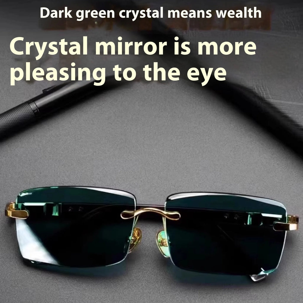 Frameless dark green crystal sunglasses with a glasses case and cleaning cloth.