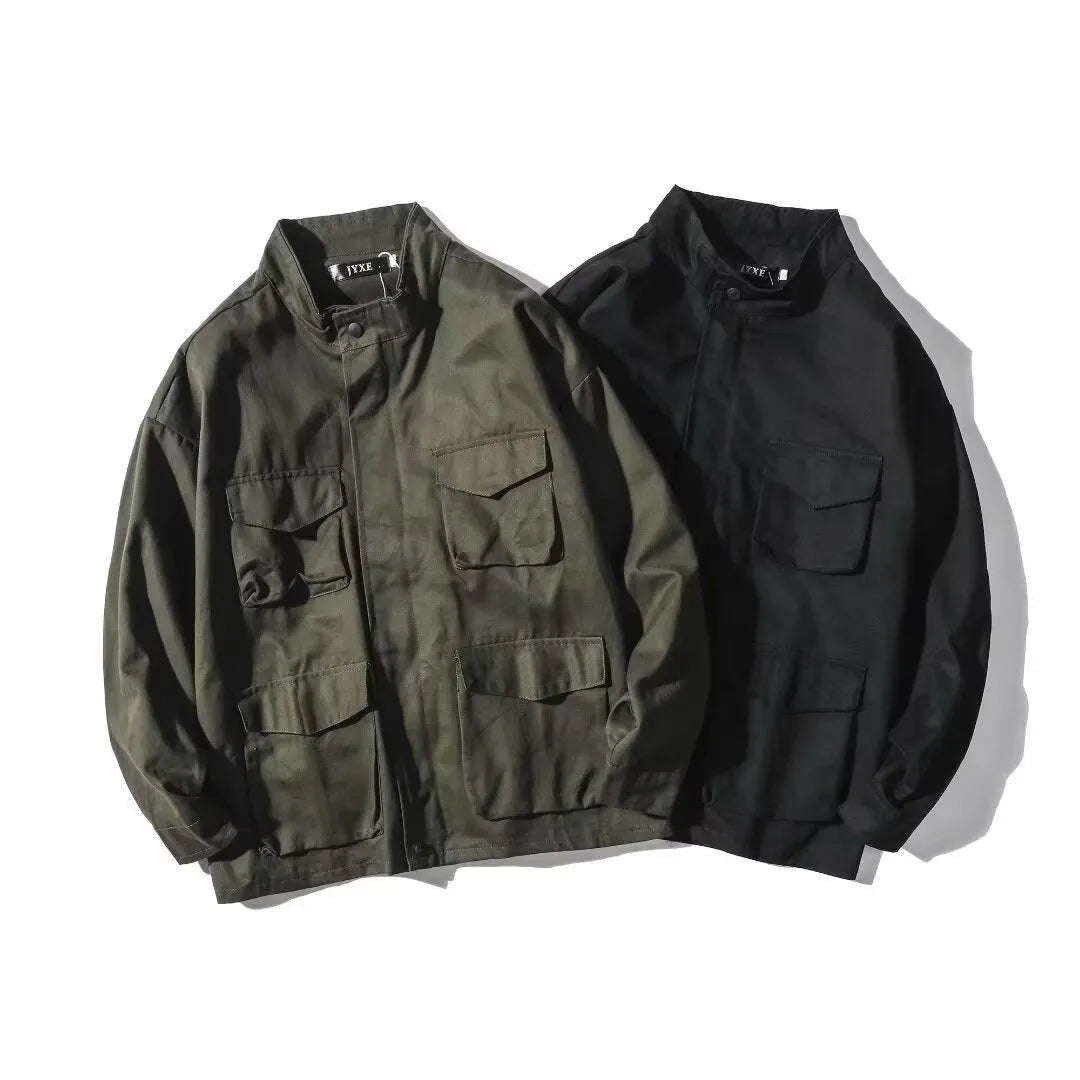 Men's multi-pocket workwear jacket in black or green, loose fit, long sleeve, sizes M to 3XL