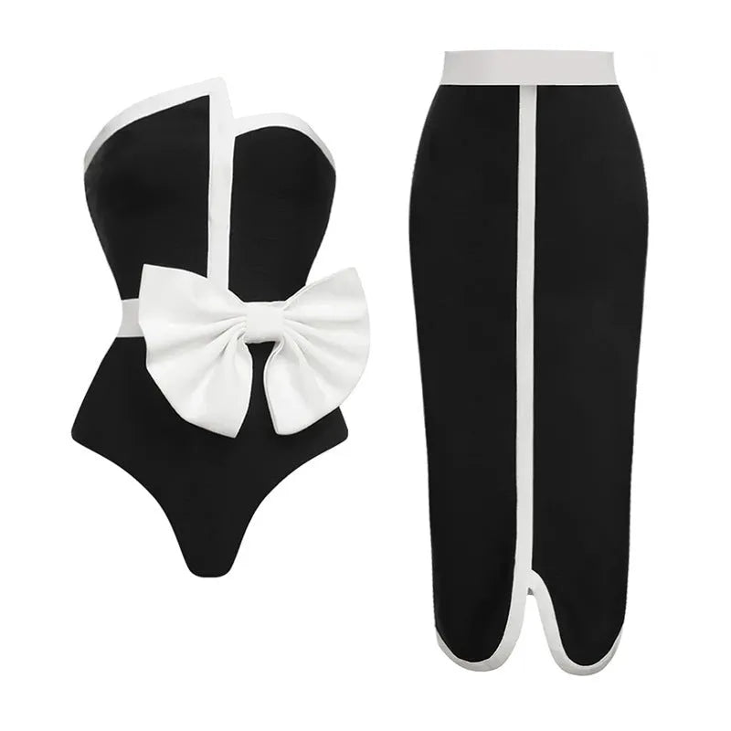 Women's black and white colour-block one-piece swimsuit with bow detail and tube top neckline