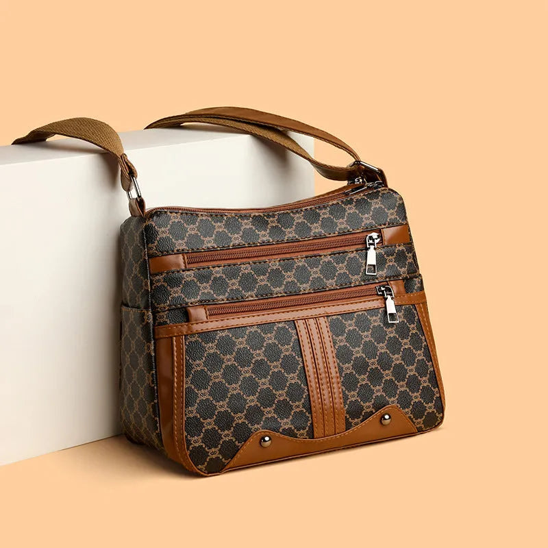 Women's brown stitching pattern crossbody bag made from PU leather with large interior capacity