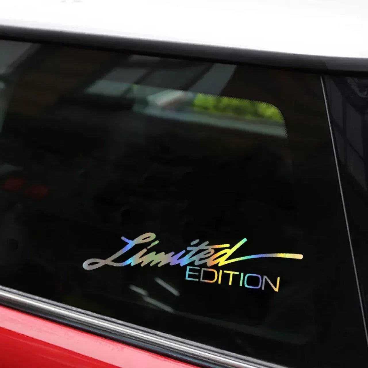 Black reflective laser-cut car sticker on vehicle window