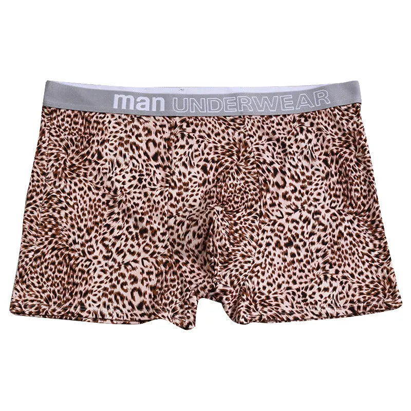 Men's loose leopard print underwear in milk silk polyester fabric showing mid waist design