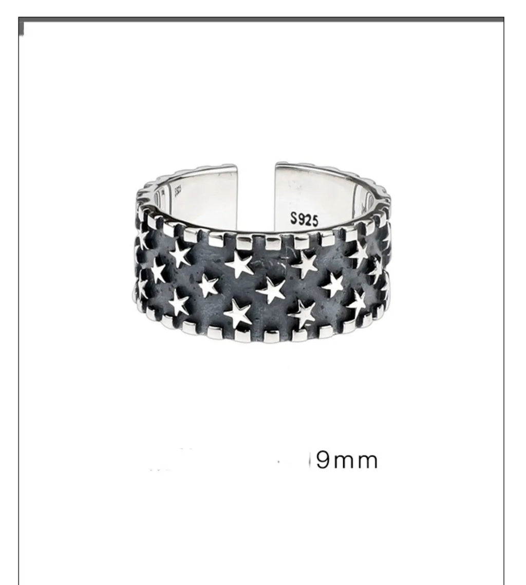 Adjustable silver ring with geometric five-pointed star pattern