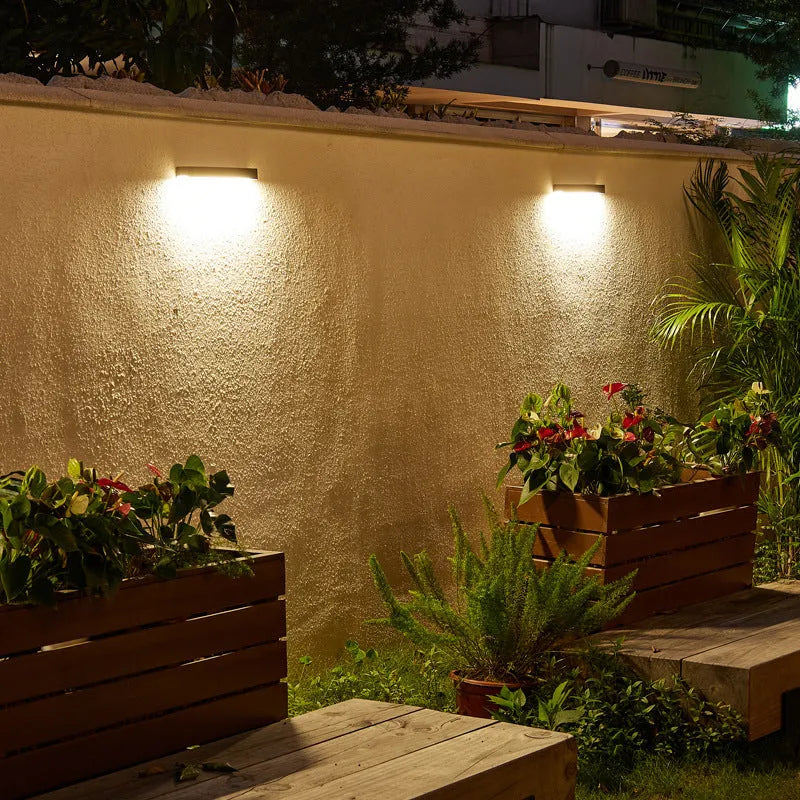 Black ABS plastic solar wall lamp for outdoor garden lighting with IP65 weather protection