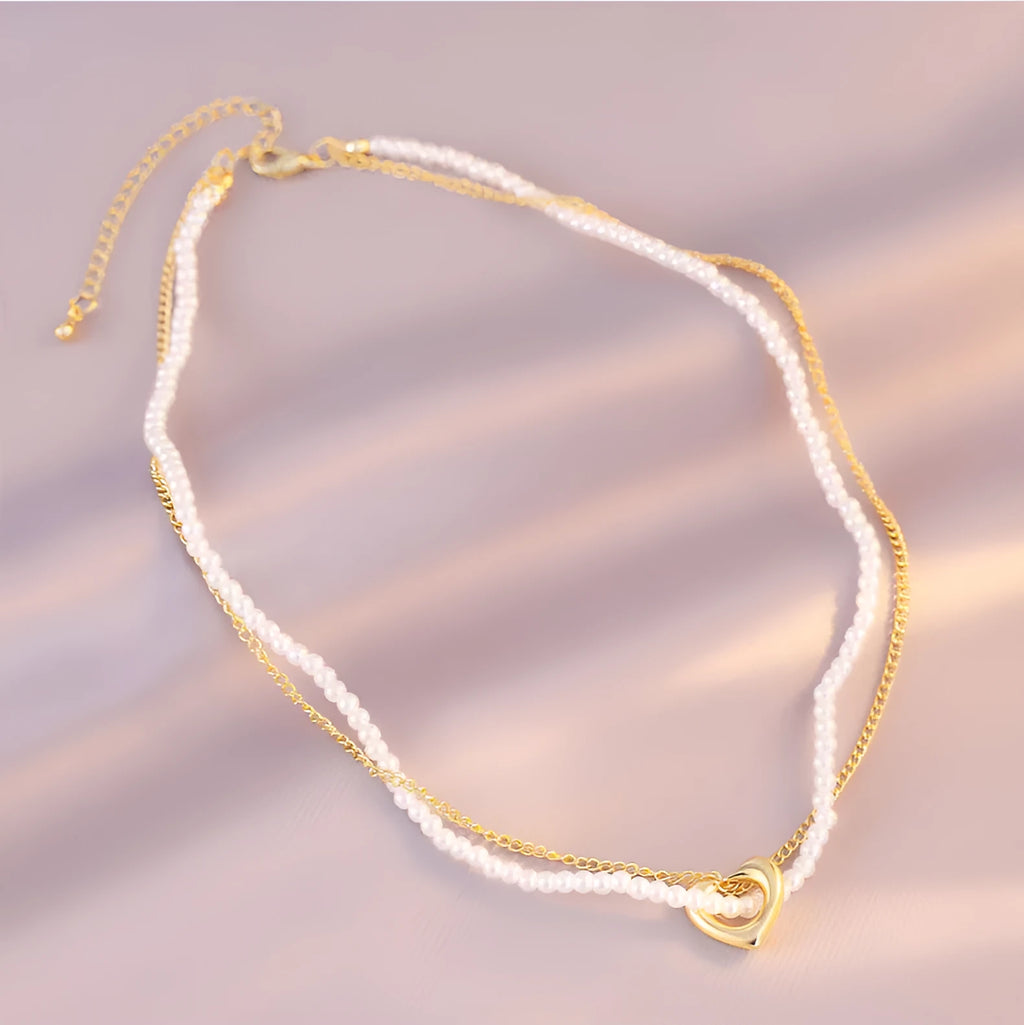 Female vintage retro imitation pearl necklace with geometric shape, adjustable 21-50cm perimeter, available in multiple colours