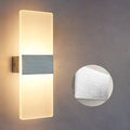 Modern wall-mounted LED bedside lamp with acrylic shade in silver finish