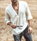 Short-sleeved button-up shirt for men in apricot cotton blend laid flat