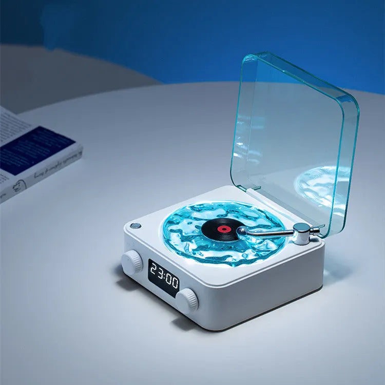 Retro Bluetooth speaker with rotating transparent turntable and RGB lighting projection