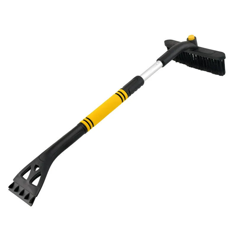 Yellow car telescopic snow shovel with aluminium handle, PVC brush and PP plastic scraper extended to 80cm on snowy windscreen