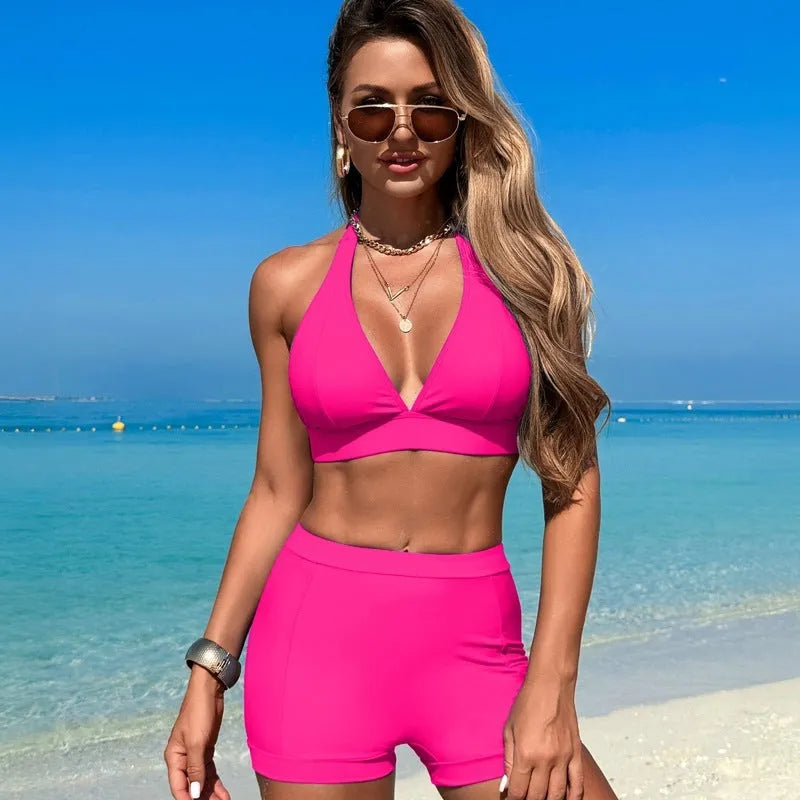 Women's black nylon bikini swimsuit on a hanger with other colour options shown.