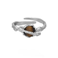 Saturn tigereye open ring for women with adjustable opening and white gold electroplated finish