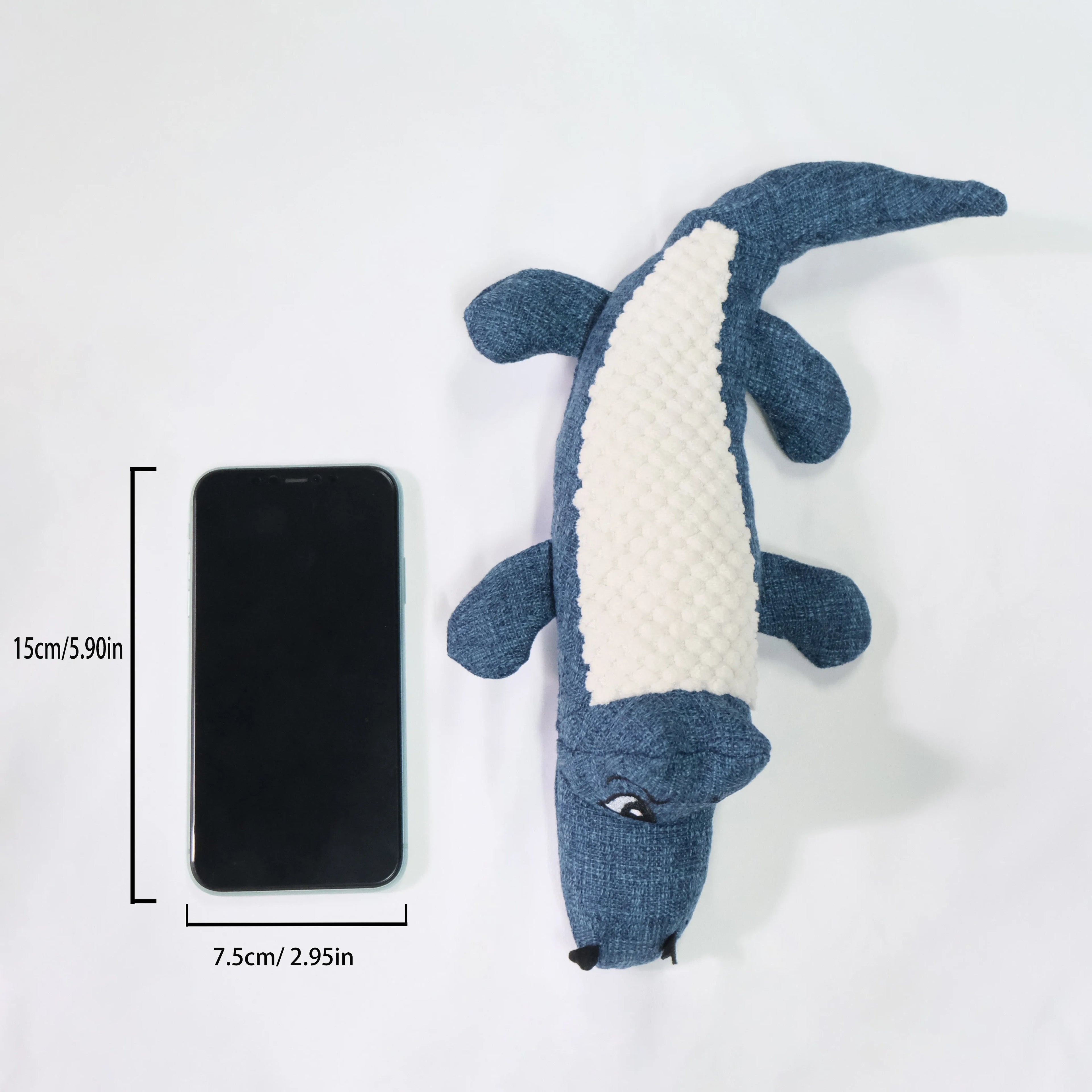 Blue, green, and red corn-shaped plush pet toys with a grid texture on a white background