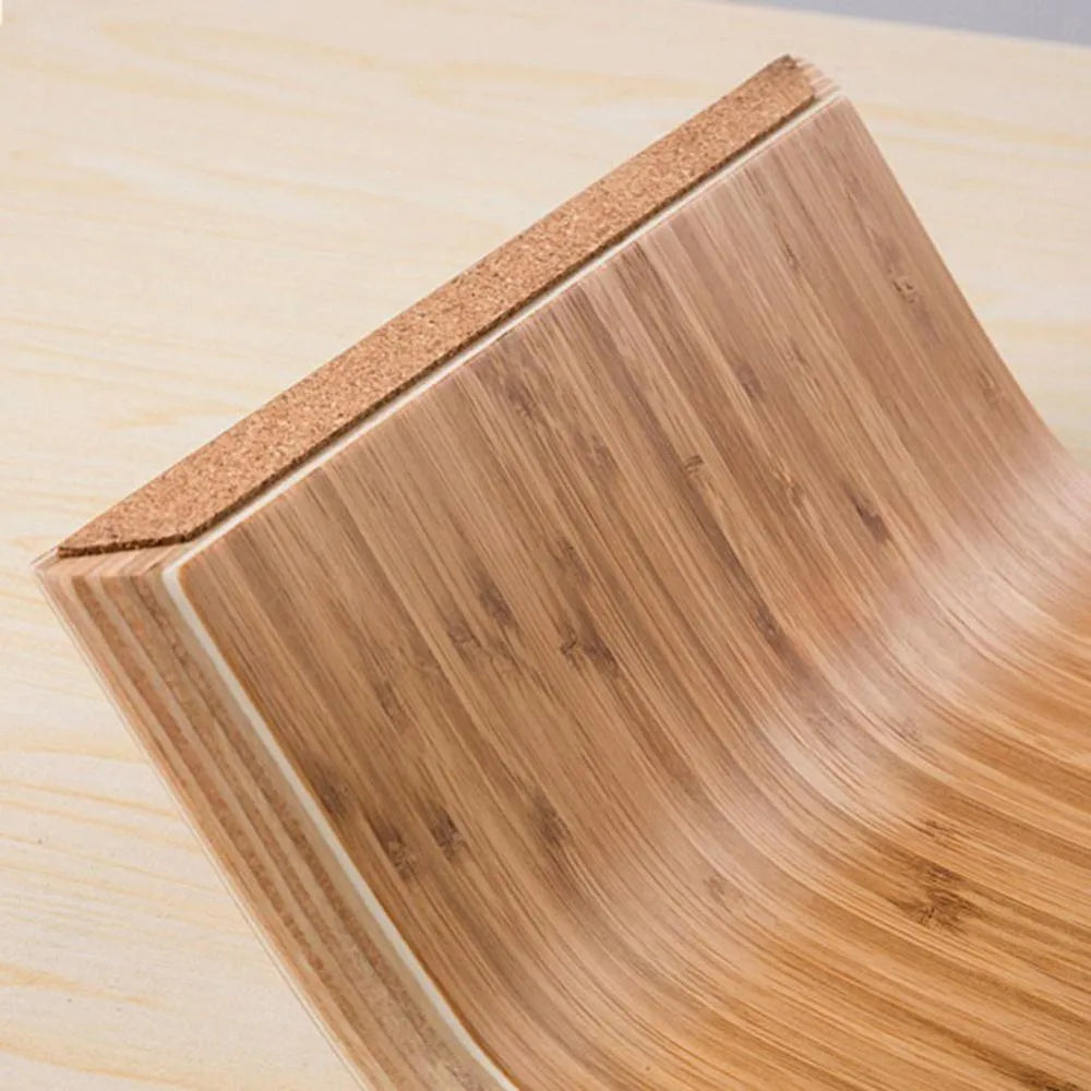 Walnut laptop stand with stability bracket in bamboo leather colour on a desk