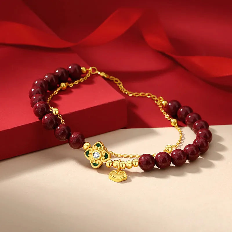 Sterling silver women's bracelet with geometric design featuring Ruyi, Xiangyun motifs and cinnabar flower detail.