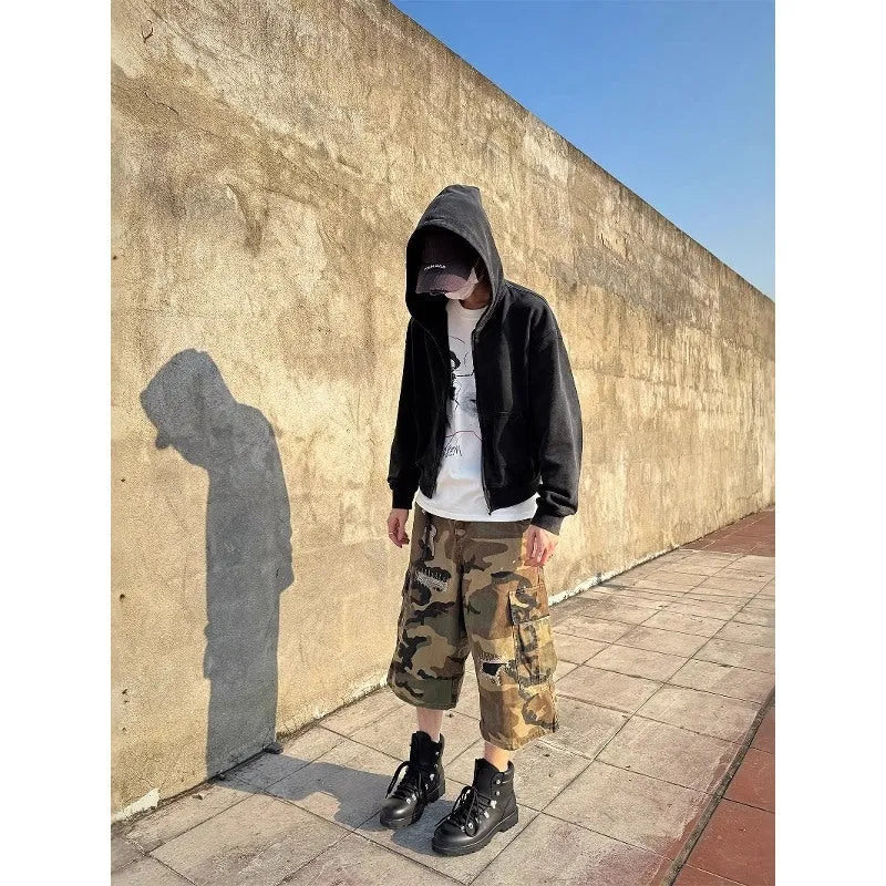 Men's camouflage cropped jeans with retro patches and ripped knees in straight cut loose fit