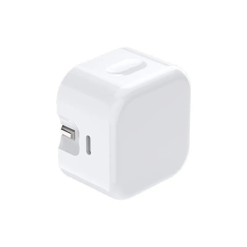 White 20W USB-C UK wall charger with a fixed three-pin plug and a USB-C cable.