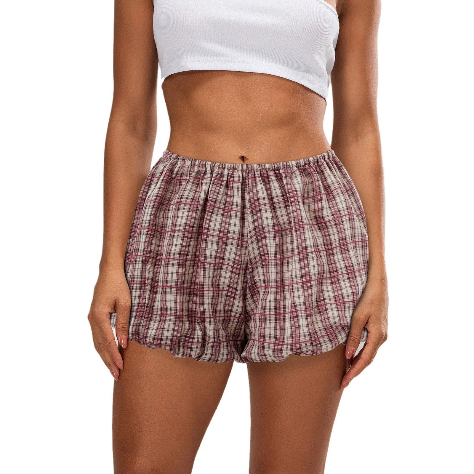 Women's casual polyester shorts with elastic waist in dark khaki colour showing printed fold details