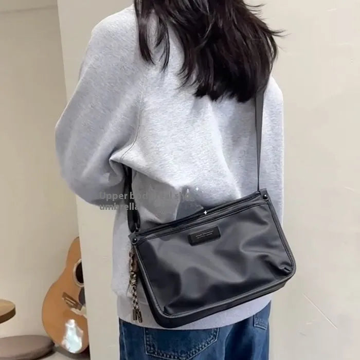 Small square crossbody bag in trendy cool colour made from Oxford cloth with street trend styling