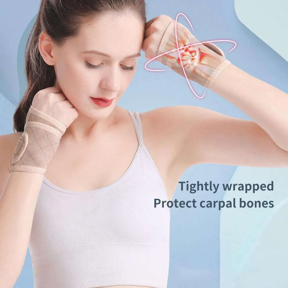 Black adjustable wrist brace for carpal tunnel support with hook-and-loop strap on hand