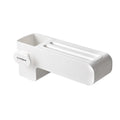 White plastic kitchen knife rack on countertop with dimensions 26 cm height