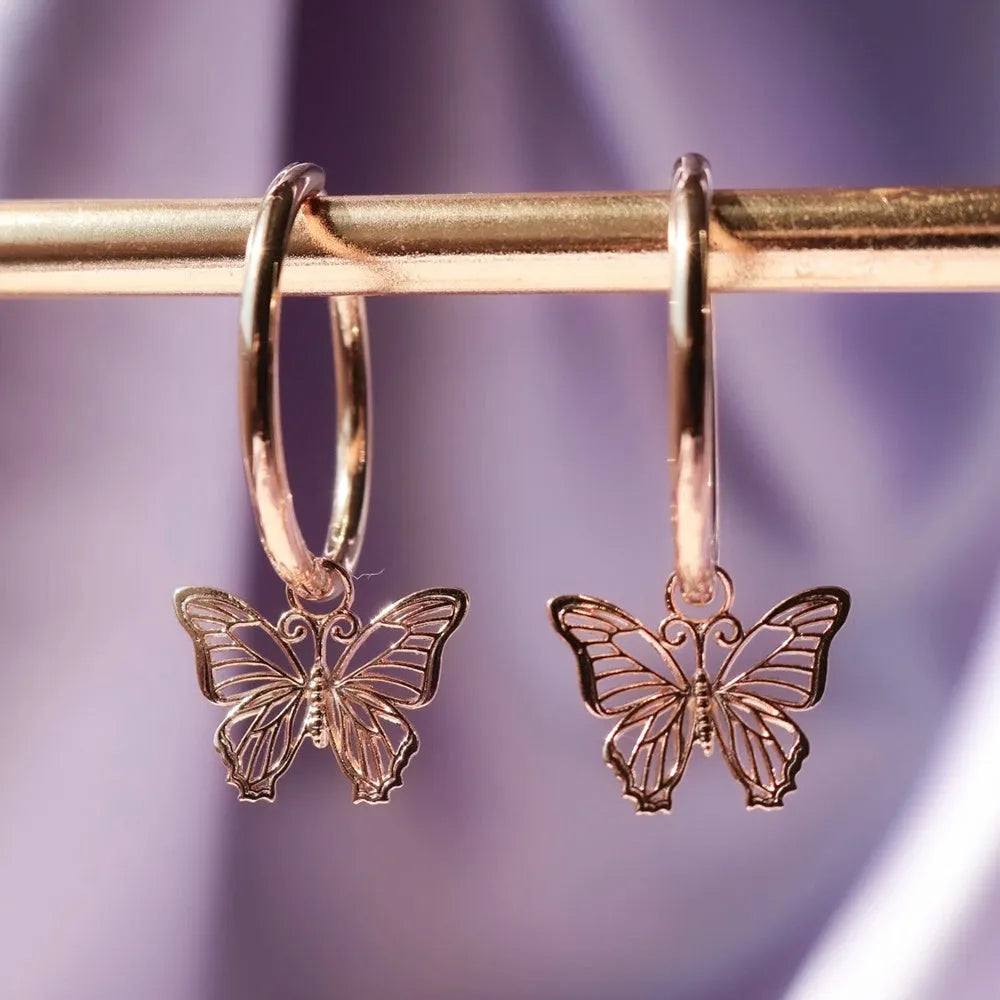 Gold and rose gold butterfly bow stud earrings, electroplated finish on copper alloy base