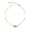 Gold tone and silver tone alloy pineapple bracelets for women on a white background.