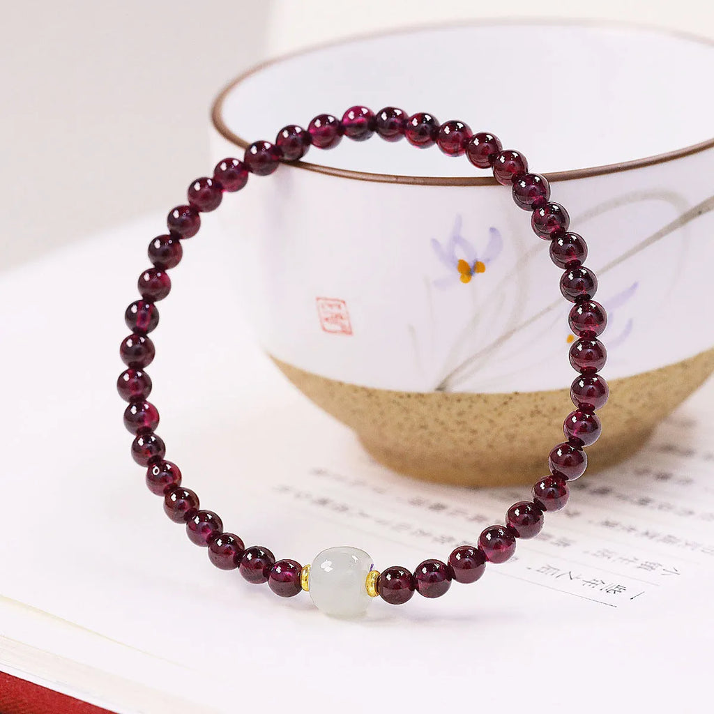 Natural garnet bracelet with U-shaped design showing 4mm and 6mm bead size options