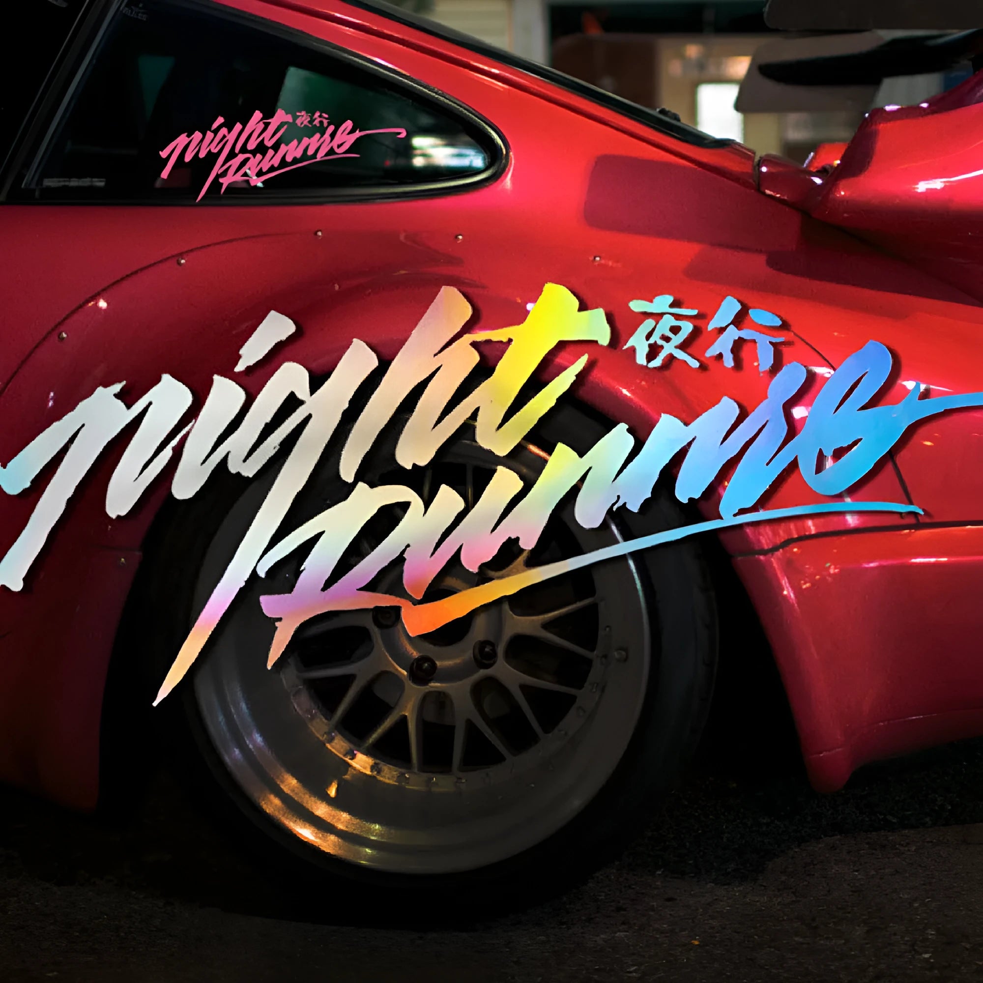 Nightwalker car rear windshield sticker showing text design in black, colourful, or pink on a 20cm or 32cm long decal.