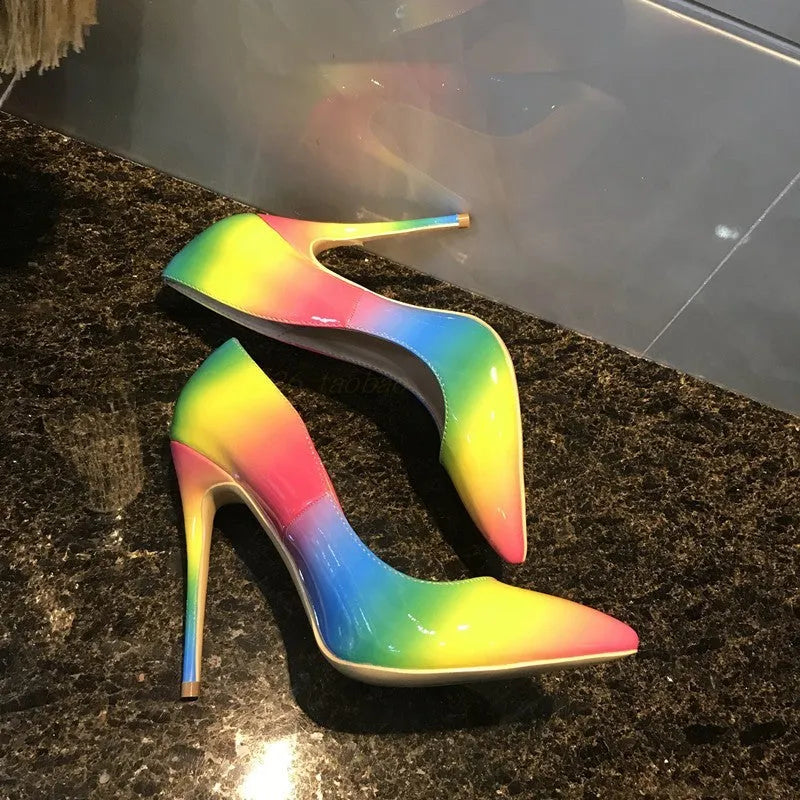 Rainbow glossy patent leather women's ultra-high heel shoes with a pointed toe and thin stiletto.