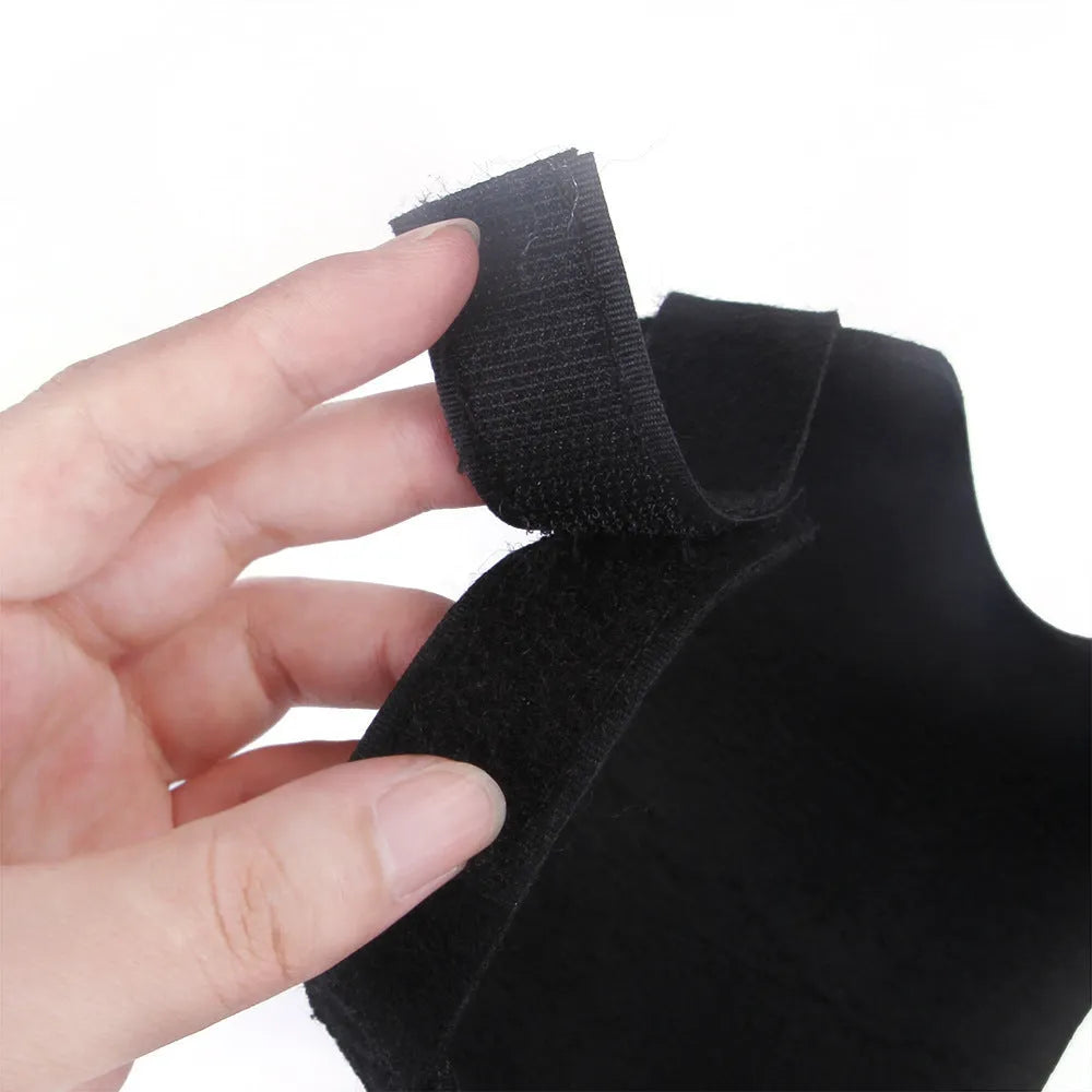 Black felt pet Halloween vest with bloody plastic knife prop for cats and dogs, hook and loop fasteners, side view
