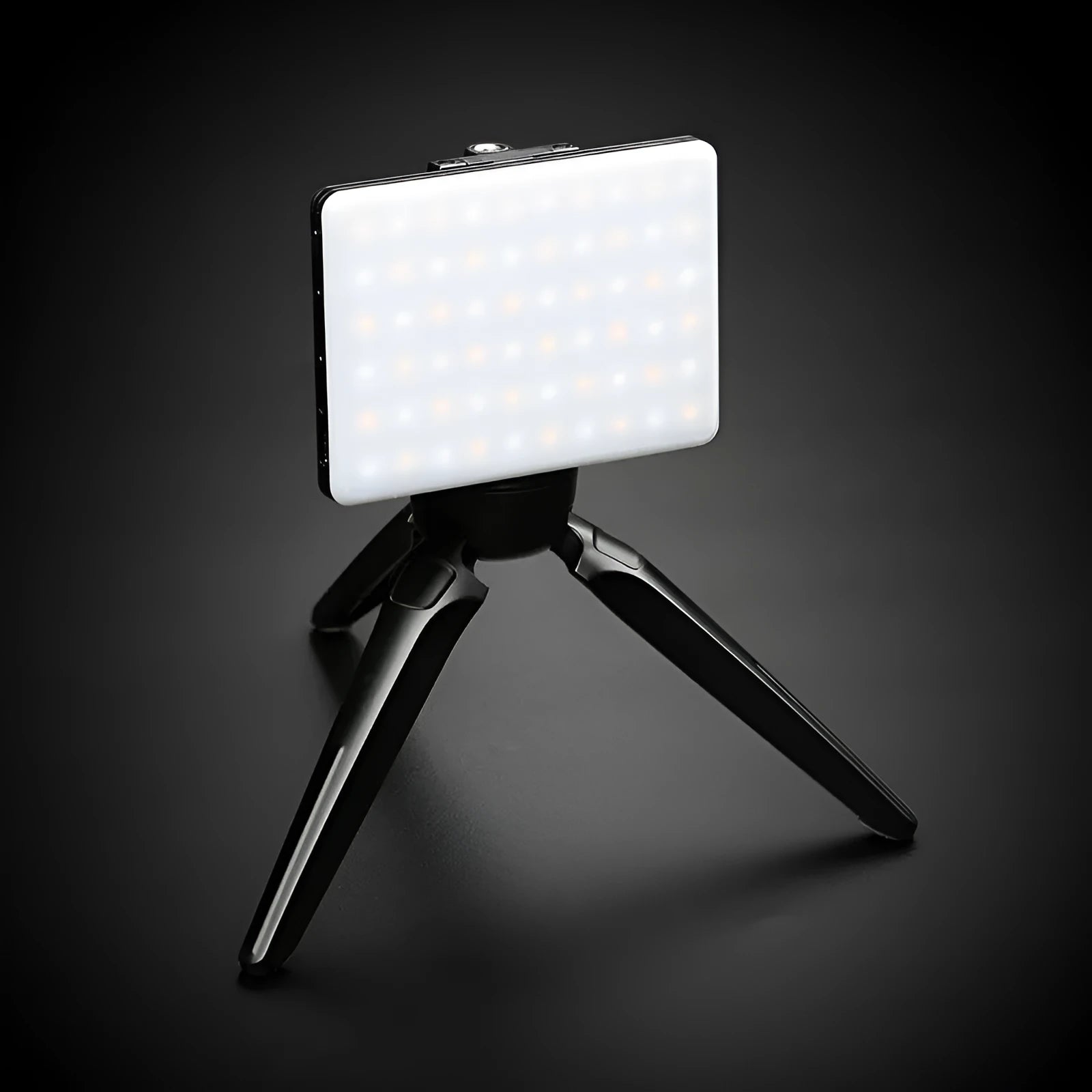 White portable mobile phone fill light with adjustable angle knob and clip attachment