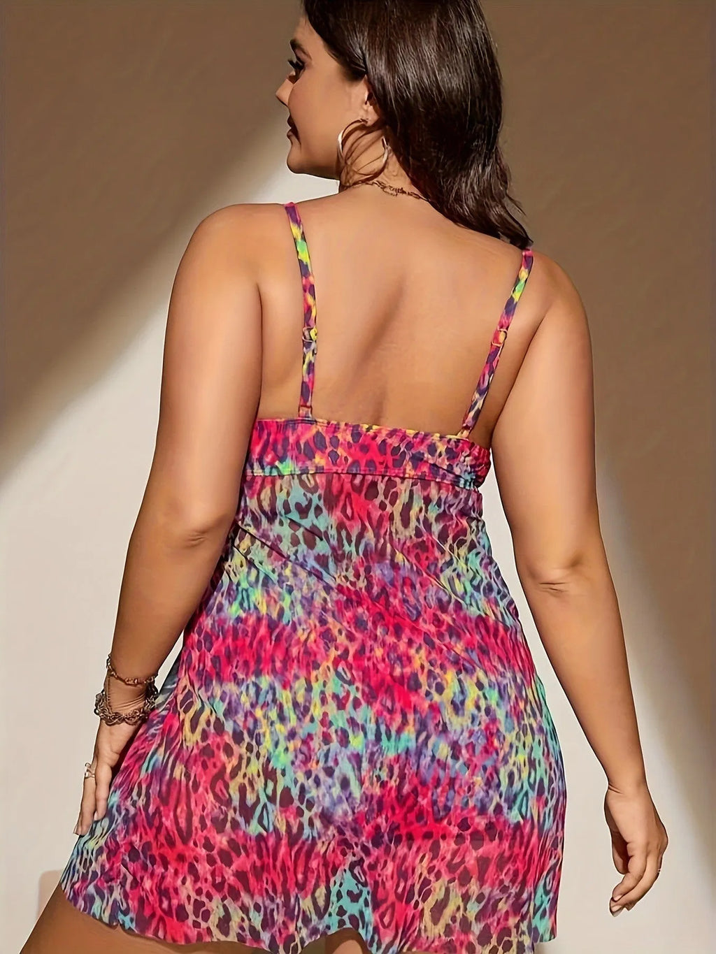 Plus size red skirt split bikini swimsuit with sleeveless top and shorts.