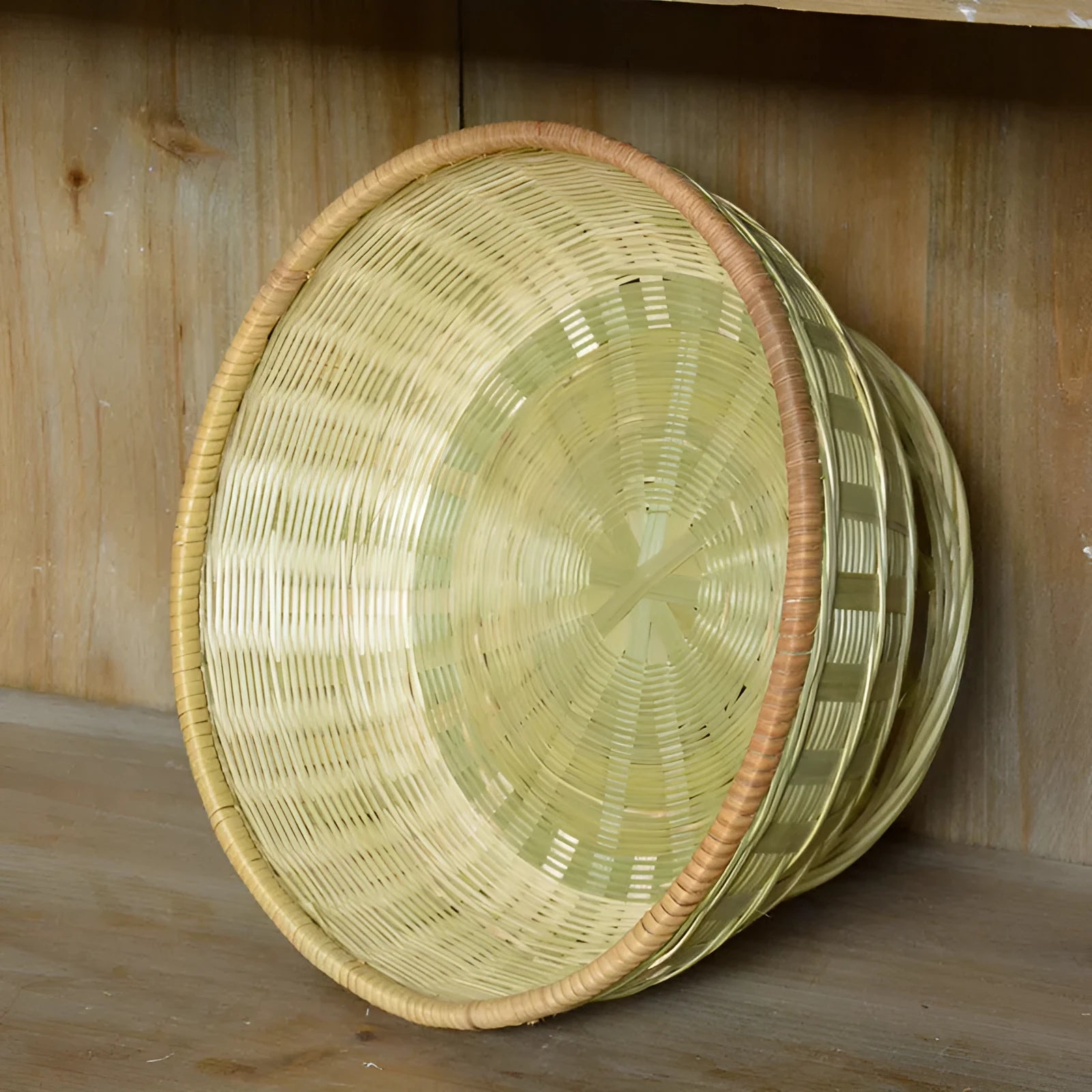 Handmade woven bamboo storage basket in three sizes for household organisation