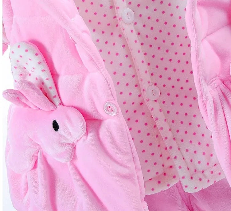 Girls' pink autumn winter three-piece clothing set with jacket, vest, and long trousers on a hanger.