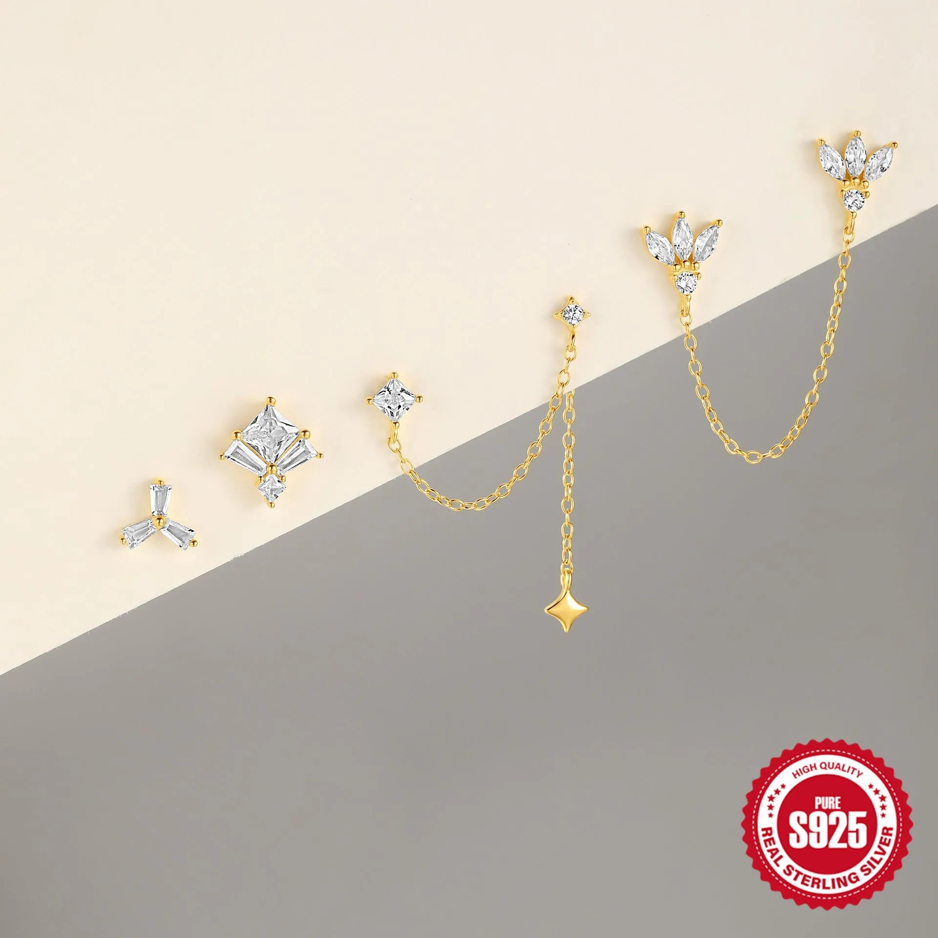 Golden geometric sterling silver earrings with zircon inlays for double piercings