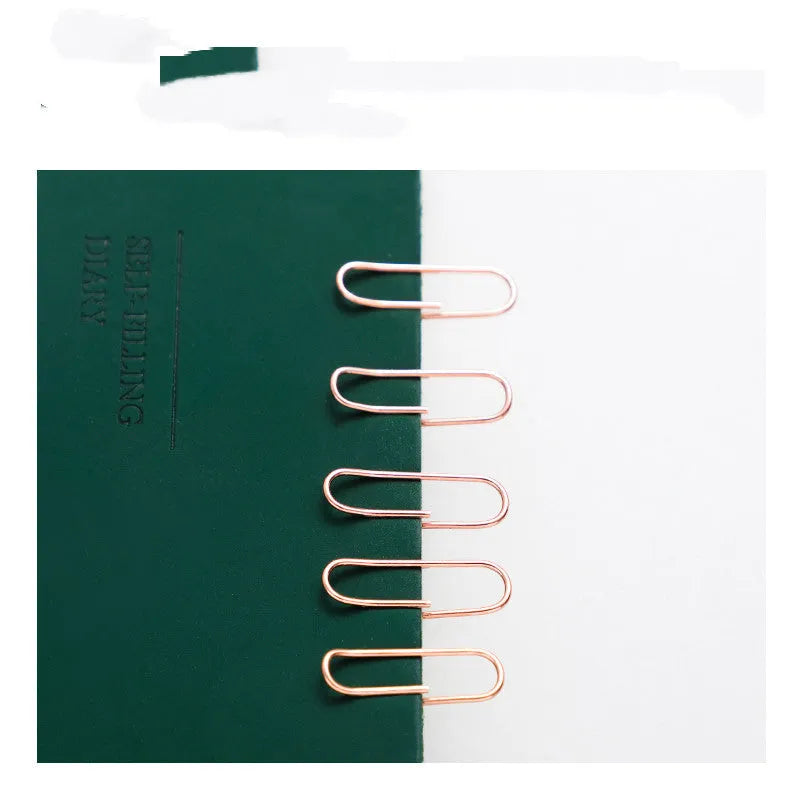 Rose gold heart-shaped paper clips with steel core construction, 28mm size