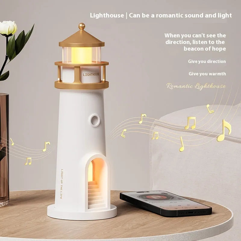 Human body induction moonlight lighthouse table lamp with Bluetooth speaker, 2400mAh battery, geometric modern style on a bedside table