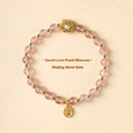 Hand-woven gray moonstone crystal bracelet with pink sunstone and peach strawberry quartz beads