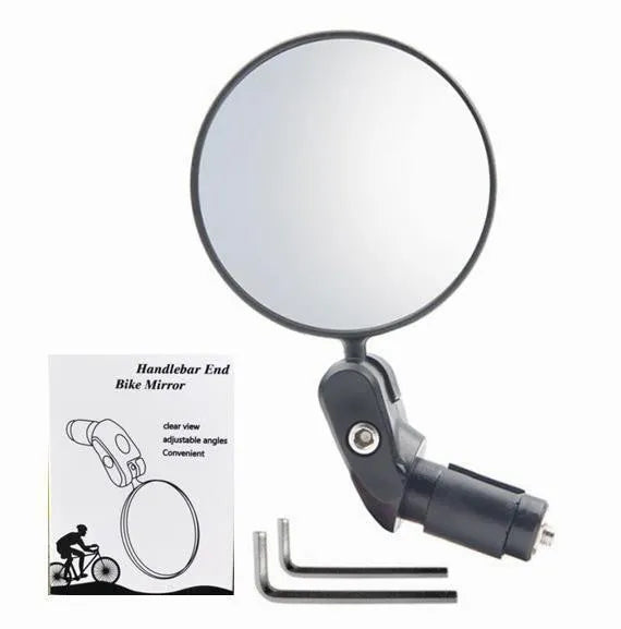 Black foldable convex rearview mirror on a car side mirror, showing its adjustable angle.