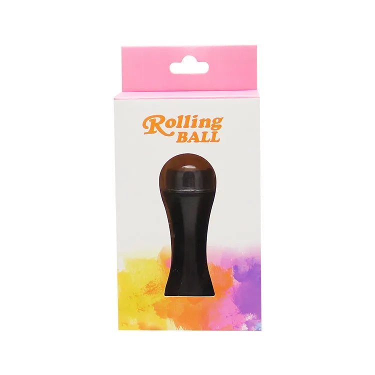 Portable volcanic stone facial roller for oily skin control in choice of colours.