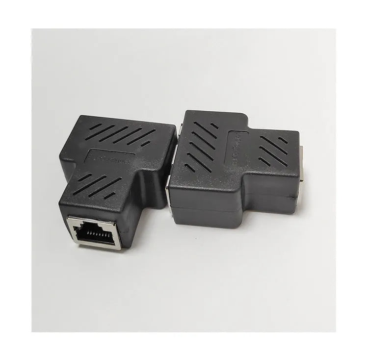 Two white RJ45 network splitter adapters for sharing one ethernet cable connection.