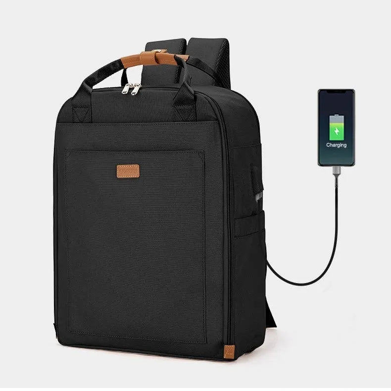 Unisex nylon backpack in black or creamy-white with curved shoulder strap and 20-35L business travel capacity