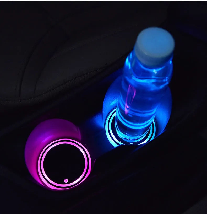 Colourful LED light-up coaster for car cup holder with USB cable and seven light colours.