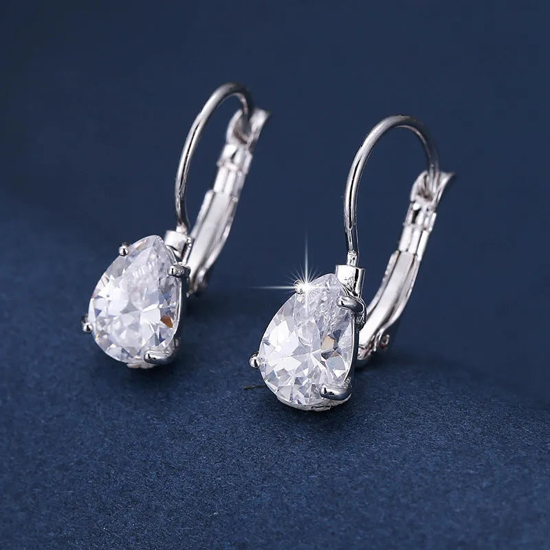 Pair of drop-shaped fashion earrings with gem inlay in gold or platinum plating