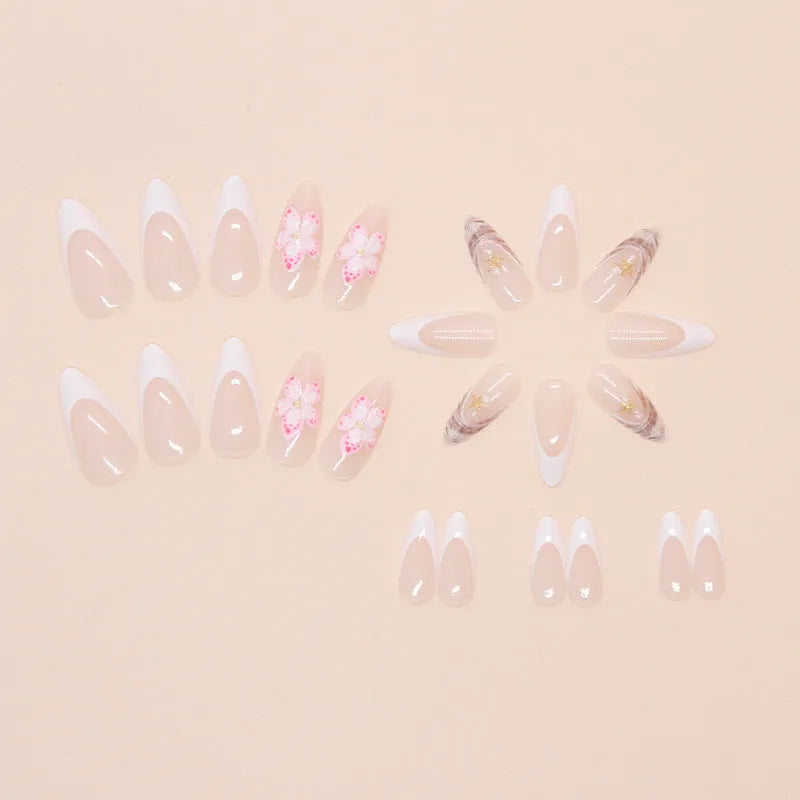 Removable fake nails with simple flower French style and rock pattern patch design in a plastic kit.