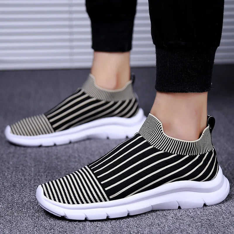 Men's breathable high-top jogging sneakers with artificial PU upper, lace-up closure, and colour-matched design for sports casual wear