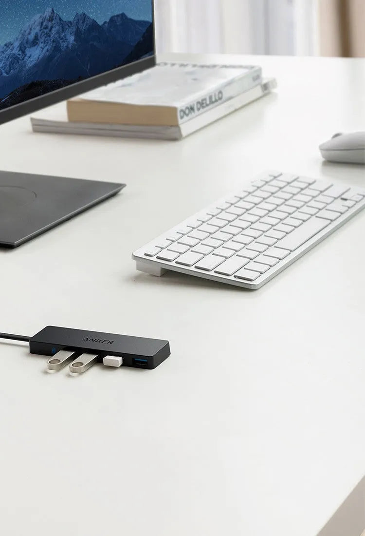 Black Anker 4-port USB 3.0 hub with 200 mm cable, showing four USB ports