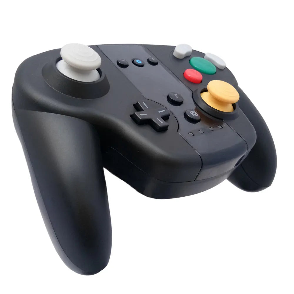 Black wireless gamepad controller with buttons, compatible with Nintendo SWITCH and Windows PCs.